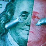 metal bull and bear on top of 100 US dollar and Chinese Yuan