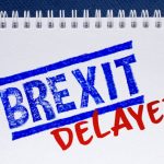 notepad with text brexit delayed